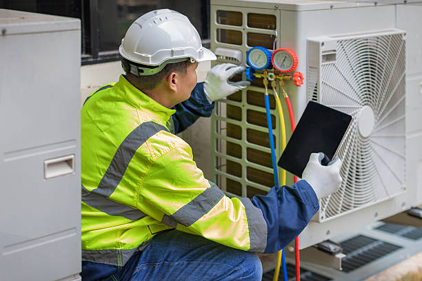 Professional Ductwork Repair technician working in Wellsville, KS